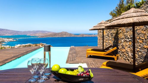  Elounda Black Pearl - Outdoor dining area next to the pool 