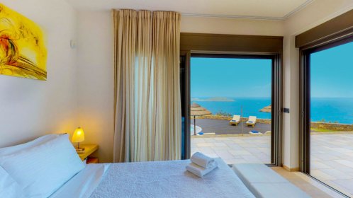  Elounda White Pearl - Bedroom with a King size bed and direct access to the pool 