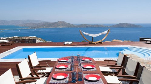  Elounda White Pearl - Outdoor dining area and swimming pool 